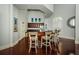Kitchenette with bar seating and a refrigerator in a shared community area at 700 S Harbour Island Blvd # 404, Tampa, FL 33602
