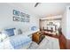 Cozy living room featuring hardwood floors, a comfortable sofa, and an open view of the kitchen area at 700 S Harbour Island Blvd # 404, Tampa, FL 33602