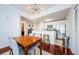 Open-concept living and dining area featuring modern lighting, hardwood floors, and comfortable seating at 700 S Harbour Island Blvd # 404, Tampa, FL 33602
