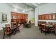 Spacious lounge with multiple tables, chairs and gorgeous wood cabinetry throughout at 700 S Harbour Island Blvd # 404, Tampa, FL 33602