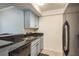 Clean kitchen featuring granite counters, updated cabinetry and stainless steel appliances at 720 Lyndhurst St # 1121, Dunedin, FL 34698