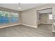 Bright dining area with large windows and stylish flooring at 7323 Andre Dr, Zephyrhills, FL 33541