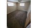 Bedroom featuring neutral-toned walls, carpeted floor, and a ceiling fan at 7735 Gaston Dr, Port Richey, FL 34668