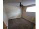 Bedroom featuring neutral-toned walls, carpeted floor, and a ceiling fan at 7735 Gaston Dr, Port Richey, FL 34668