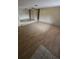 Neutral living room featuring wood floors and an open layout at 7735 Gaston Dr, Port Richey, FL 34668