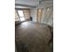 Sunroom featuring concrete floors, and blinds at 7735 Gaston Dr, Port Richey, FL 34668