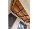 View of the underside of a porch roof with exposed beams and signs of repair at 7735 Gaston Dr, Port Richey, FL 34668