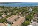 Scenic aerial view featuring apartments with a pool surrounded by a residential area near waterfront at 800 S Dakota Ave # 221, Tampa, FL 33606