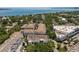 The aerial view shows buildings and apartments in a residential neighborhood close to the water at 800 S Dakota Ave # 221, Tampa, FL 33606