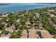 Breathtaking aerial view of a community near the water with lush landscaping and city views at 800 S Dakota Ave # 221, Tampa, FL 33606