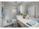 Clean bathroom with a shower-tub combo and a white vanity for a refreshing experience at 800 S Dakota Ave # 221, Tampa, FL 33606