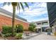Inviting outdoor courtyard with shade, seating, and landscaped areas for a relaxing shopping experience at 800 S Dakota Ave # 221, Tampa, FL 33606