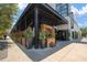 Trendy restaurant with stylish facade, featuring outdoor seating and vibrant foliage at 800 S Dakota Ave # 221, Tampa, FL 33606