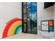 Exterior view of stairwell entrance with mural at Hyde Park Village at 800 S Dakota Ave # 221, Tampa, FL 33606