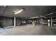 Indoor parking garage with vehicle storage area and security gate at 800 S Dakota Ave # 221, Tampa, FL 33606