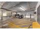 Secured indoor parking featuring motorcycle parking, charging station, and secure fence for resident storage at 800 S Dakota Ave # 221, Tampa, FL 33606