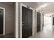 Exterior hallway with doors to apartments on the second story of the building at 800 S Dakota Ave # 221, Tampa, FL 33606