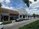 Street view features Irish 31 Pub House & Eatery and CineBistro under a partly cloudy sky at 800 S Dakota Ave # 221, Tampa, FL 33606