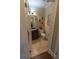 Bathroom featuring vanity with dark wood and decorative tile flooring and light walls at 8910 Eagle Watch Dr, Riverview, FL 33578