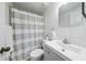 Nicely updated bathroom with a shower and modern vanity provides a clean and refreshing space at 9122 Suffield Ct, Tampa, FL 33615