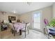 Cozy dining area filled with natural light and tile flooring at 9122 Suffield Ct, Tampa, FL 33615