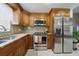Well-equipped kitchen with stainless steel appliances and granite countertops at 9122 Suffield Ct, Tampa, FL 33615