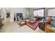 Comfortable living room features tile floors and a view of the front door at 9122 Suffield Ct, Tampa, FL 33615