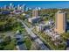 Expansive aerial view of the property, showcasing its urban location near the city, parks, and neighborhood streets at 920 N Shore Ne Dr, St Petersburg, FL 33701