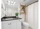 Well-maintained bathroom with a white vanity, granite countertop, and a shower-tub combination at 920 N Shore Ne Dr, St Petersburg, FL 33701