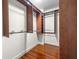 Spacious walk-in closet with custom shelving and hardwood floors, providing ample storage space at 920 N Shore Ne Dr, St Petersburg, FL 33701