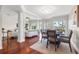 Open-concept living and dining area with hardwood floors and plenty of natural light at 920 N Shore Ne Dr, St Petersburg, FL 33701