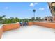 Beautiful rooftop deck with chairs, providing ample space for outdoor enjoyment and entertaining at 920 N Shore Ne Dr, St Petersburg, FL 33701