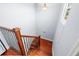Classic staircase with wood and wrought iron, providing a stylish transition between floors in the home at 920 N Shore Ne Dr, St Petersburg, FL 33701