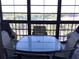 Balcony with seating offering a view of the water and mature landscaping at 9860 62Nd N Ter # 1036, St Petersburg, FL 33708