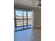 Sliding glass doors provide views from a balcony to the exterior and a lot of natural light at 9860 62Nd N Ter # 1036, St Petersburg, FL 33708