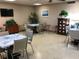 Bright and spacious dining area with multiple tables and seating arrangements at 9860 62Nd N Ter # 1036, St Petersburg, FL 33708