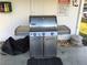 A stainless steel Weber Genesis grill provides a modern outdoor cooking space at 9860 62Nd N Ter # 1036, St Petersburg, FL 33708