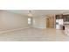 Bright and spacious living area with tile floors, recessed lighting, and a modern color scheme at 9917 Ivory Dr, Ruskin, FL 33573