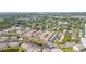 Aerial view showcasing the community, landscaping, and surrounding area at 10034 64Th N Ave # 14, St Petersburg, FL 33708