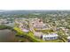 Aerial view featuring the condo community near a lake and green landscape at 10034 64Th N Ave # 14, St Petersburg, FL 33708