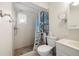 Bright bathroom featuring a standup shower with starfish decor and decorative tiling at 10034 64Th N Ave # 14, St Petersburg, FL 33708