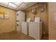 Well maintained laundry room features coin operated washers and dryers at 10034 64Th N Ave # 14, St Petersburg, FL 33708