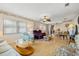 Cozy living room with wood floors and comfortable seating, a relaxing space at 10034 64Th N Ave # 14, St Petersburg, FL 33708
