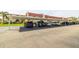 Designated covered parking area in front of well-maintained condo building at 10034 64Th N Ave # 14, St Petersburg, FL 33708