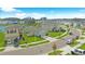 Aerial view of home nestled in a well-maintained community with a view of the lake at 10914 Penny Gale Loop, San Antonio, FL 33576