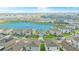 Stunning aerial view of the property, showcasing its location near the lake, amenities, and beautiful surroundings at 10914 Penny Gale Loop, San Antonio, FL 33576