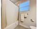 Bathroom featuring a tub, shower, and neutral tiling at 120 Moscata Way, Nokomis, FL 34275