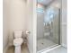 Bathroom features a glass-enclosed shower and modern fixtures at 120 Moscata Way, Nokomis, FL 34275