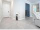 Spacious foyer with tile flooring leading to the main living areas at 120 Moscata Way, Nokomis, FL 34275