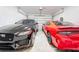 Spacious two-car garage featuring ample room for parking and storage at 120 Moscata Way, Nokomis, FL 34275